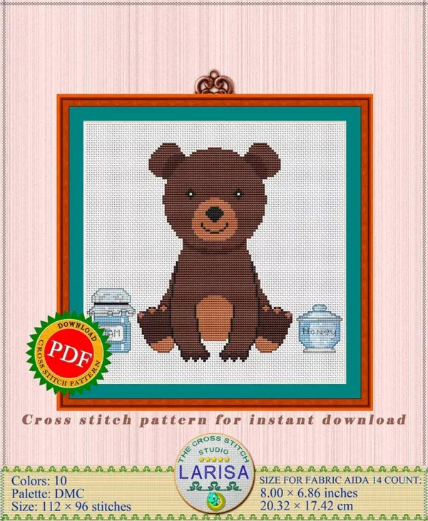 Adorable bear cub in cross stitch